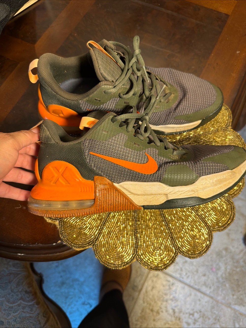 Nike men’s Olive Green Sneakers with Bright Orange Swoosh